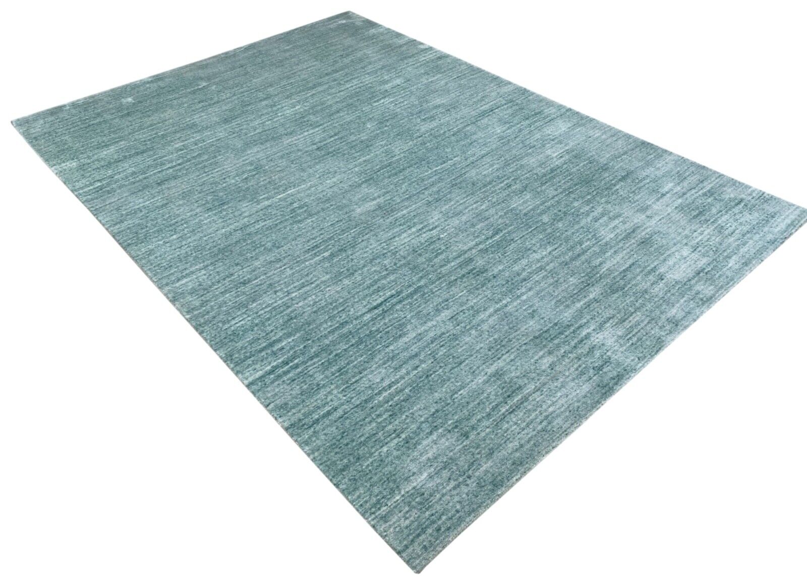 Ručno tkani tepih za vanjsku i unutarnju upotrebu. Ekološki prihvatljiva PET pređa, jednobojna.