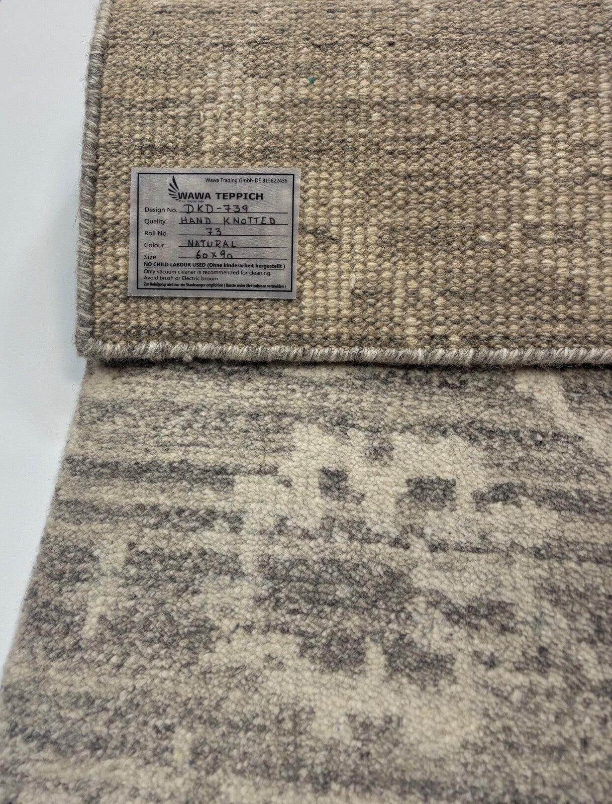 Tappeto in lana annodato a mano 60x90cm a pelo corto moderno grigio chiaro naturale D739